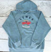 Load image into Gallery viewer, washed ocean vintage wash hoodie with a red pickup truck and surfboards graphic, text "Lewes Delaware Est. 1631 Surf", laid flat on a distressed white wooden background.