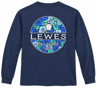 Lewes Sea Turtle Long Sleeve Tee in Reactive Navy, back view, with a sea turtle over blue and green hibiscus flowers in a Lewes Delaware 1631 circle