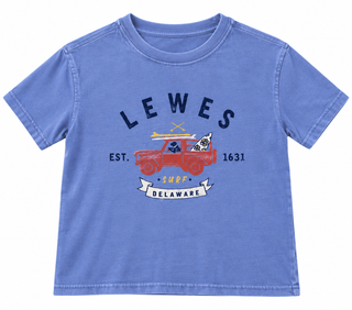 Lewes Surf Dog Jeep Youth Tee in Washed Periwinkle with a navy Lewes arched over a red jeep carrying a black dog and surfboards, Est. 1631, and a Surf Delaware banner
