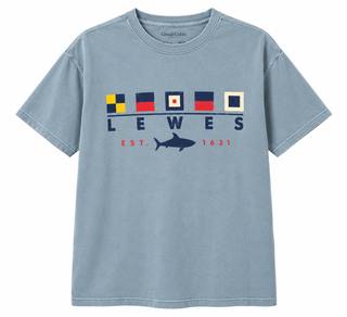 Lewes Sail Flag Shark Tee in Denim blue with five nautical signal flags, navy LEWES lettering, and a navy shark between red EST. 1631