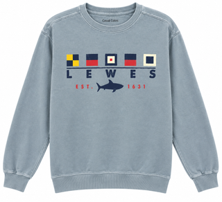 Lewes Sail Flag Shark Crewneck Sweatshirt in Denim blue with five nautical signal flags, navy LEWES lettering, and a navy shark between red EST. 1631