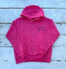 Load image into Gallery viewer, Front view of a vibrant pink children&#39;s pullover hoodie with an embroidered &#39;LEWES&#39; logo and crossed oars on the chest, featuring a kangaroo pocket and hood, laid on a distressed white wooden surface.
