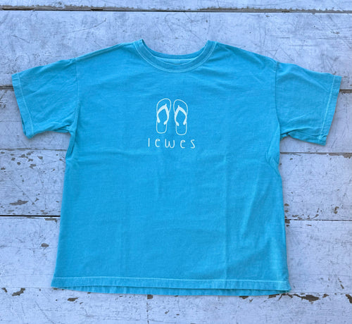 Aqua blue short-sleeve t-shirt with a white outline graphic of two flip-flops above the word 