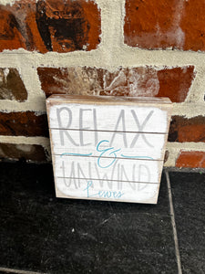 RELAX AND UNWIND WOOD SIGN